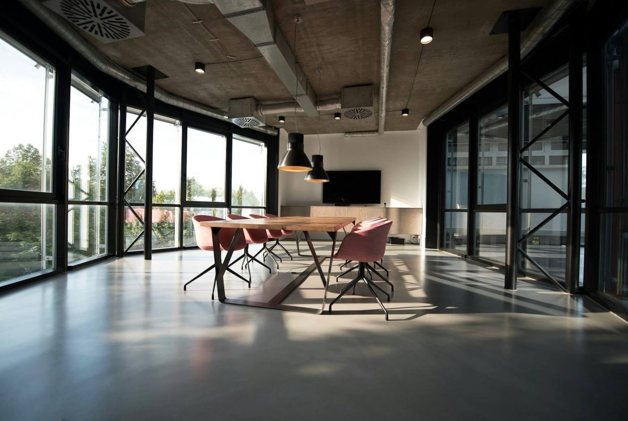 Open-plan workspaces blur the lines between management teams and employees for a more unified working environment